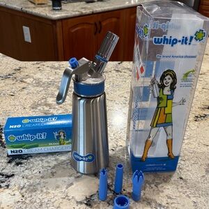 Whip-it whipped cream dispenser and cartridges